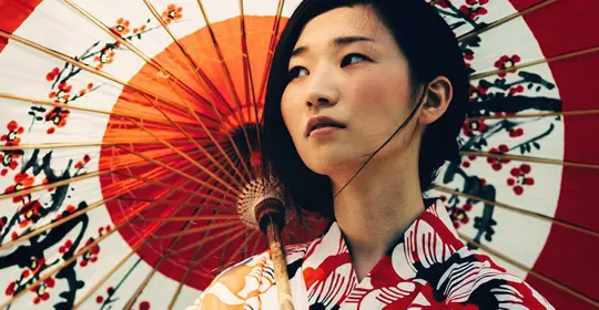 Japanese woman with decorated oil-paper umbrella